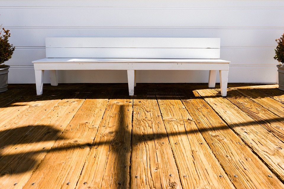 A bench on decking outside