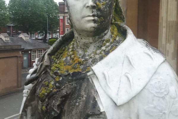 Queen Victoria Statue Steam Cleaned with Doff machine - face during cleaning